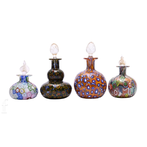 446 - A 20th Century Italian Murano glass scent bottle of spherical form with collar neck, decorated with ... 