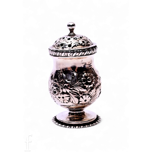 571 - A George IV hallmarked silver pounce pot, of rounded footed form with repousse floral, foliage and s... 