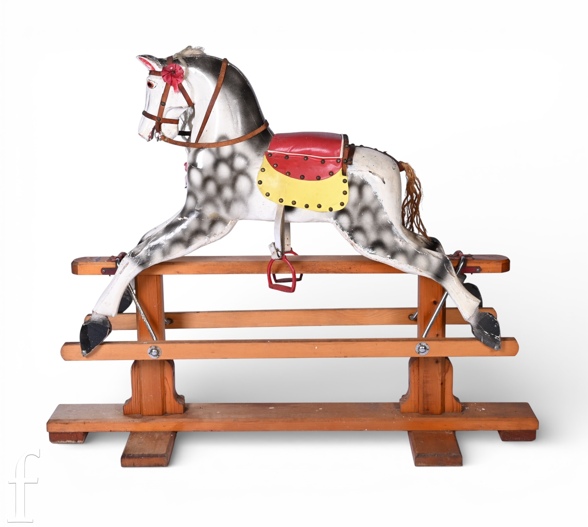 A mid 20th Century Leeway rocking horse, with dapple grey painted pine ...