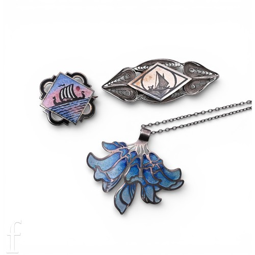 174A - Norne; A Scandinavian silver and enamel brooch, the central plaque decorated in guilloche enamel of ... 