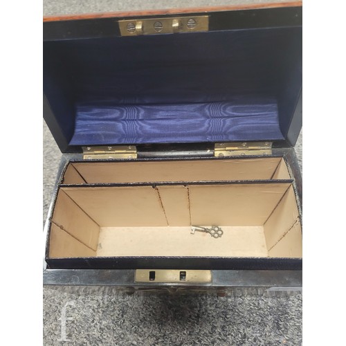 377 - A Victorian domed top ebonised wooden casket, with brass studwork and abalone 'laddered' bands, the ... 