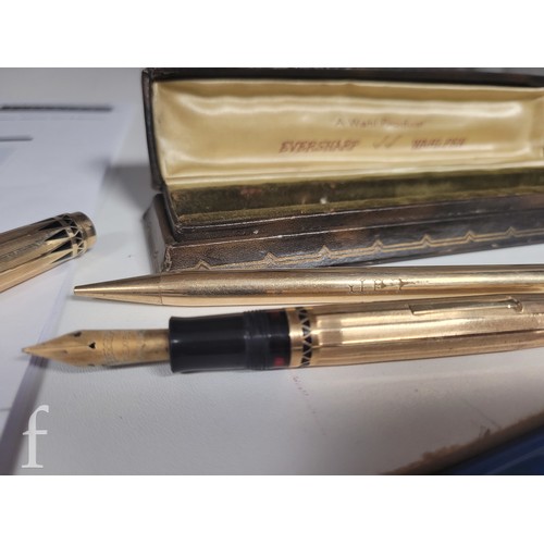 397 - A 1930s American Art Deco Wahl Eversharp gold filled Coronet Pyralin design fountain pen and pencil,... 