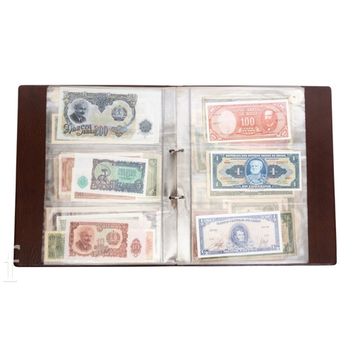 48 - Banknotes - An album of assorted world notes to include a 1965 Nigerian one pound note, Bulgarian St... 