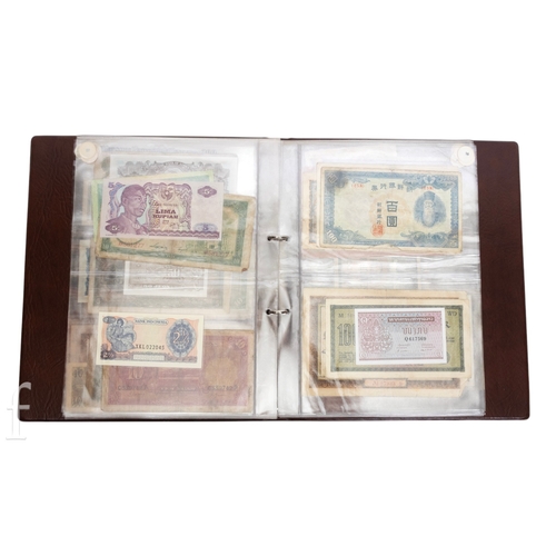48 - Banknotes - An album of assorted world notes to include a 1965 Nigerian one pound note, Bulgarian St... 