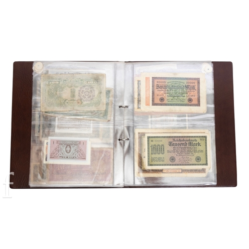 48 - Banknotes - An album of assorted world notes to include a 1965 Nigerian one pound note, Bulgarian St... 