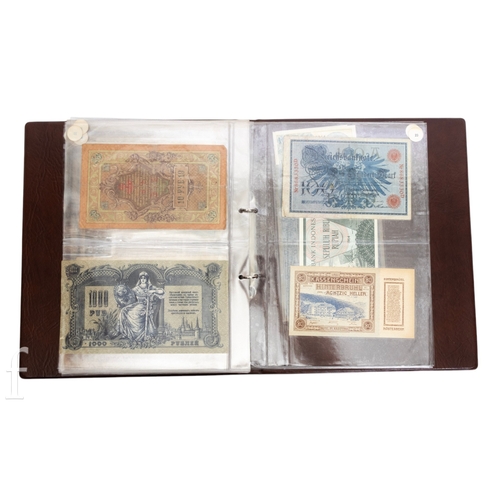 48 - Banknotes - An album of assorted world notes to include a 1965 Nigerian one pound note, Bulgarian St... 