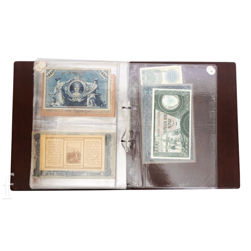 48 - Banknotes - An album of assorted world notes to include a 1965 Nigerian one pound note, Bulgarian St... 