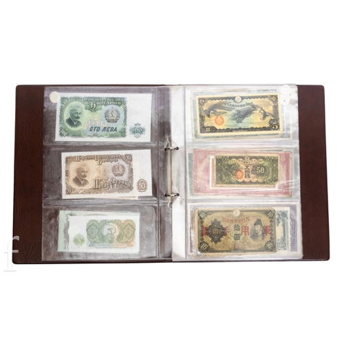 48 - Banknotes - An album of assorted world notes to include a 1965 Nigerian one pound note, Bulgarian St... 