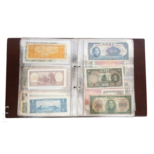 49 - Banknotes - An album of assorted world notes to include a 1965 Nigerian one pound note, Bulgarian St... 