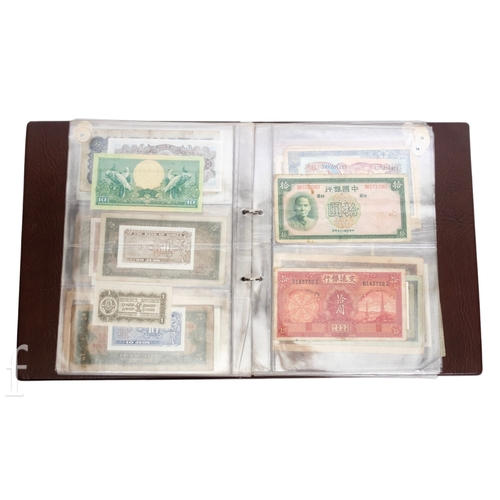 49 - Banknotes - An album of assorted world notes to include a 1965 Nigerian one pound note, Bulgarian St... 