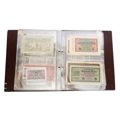 49 - Banknotes - An album of assorted world notes to include a 1965 Nigerian one pound note, Bulgarian St... 
