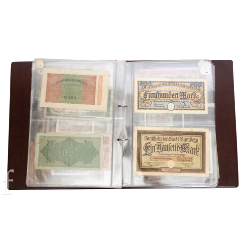 49 - Banknotes - An album of assorted world notes to include a 1965 Nigerian one pound note, Bulgarian St... 