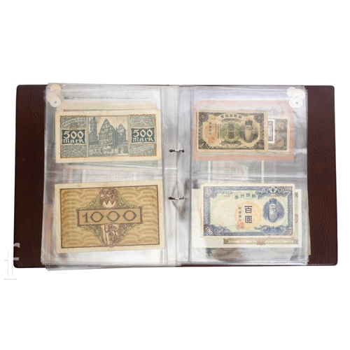 49 - Banknotes - An album of assorted world notes to include a 1965 Nigerian one pound note, Bulgarian St... 
