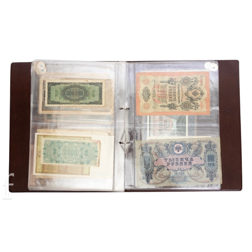 49 - Banknotes - An album of assorted world notes to include a 1965 Nigerian one pound note, Bulgarian St... 