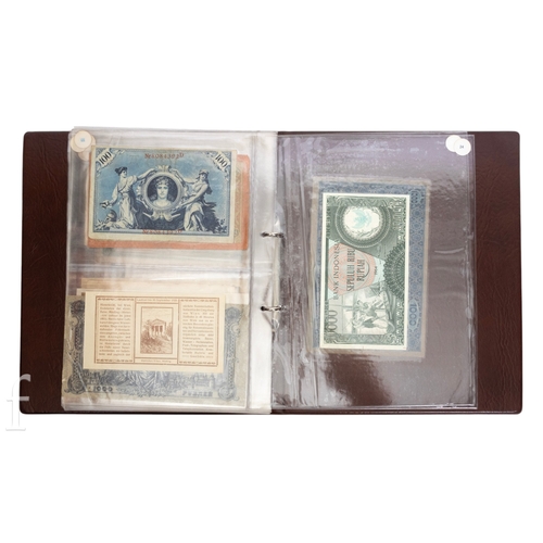 49 - Banknotes - An album of assorted world notes to include a 1965 Nigerian one pound note, Bulgarian St... 
