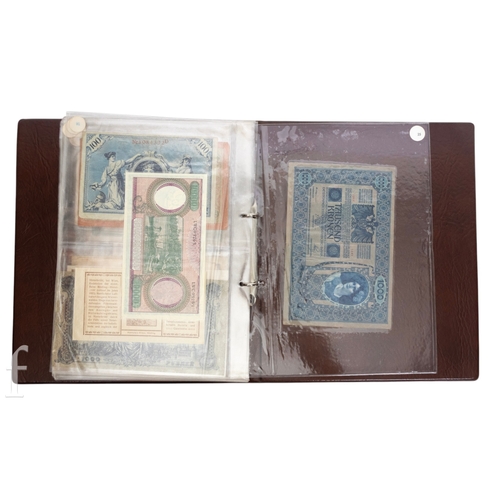49 - Banknotes - An album of assorted world notes to include a 1965 Nigerian one pound note, Bulgarian St... 
