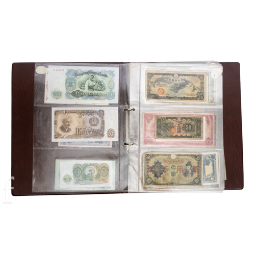 49 - Banknotes - An album of assorted world notes to include a 1965 Nigerian one pound note, Bulgarian St... 