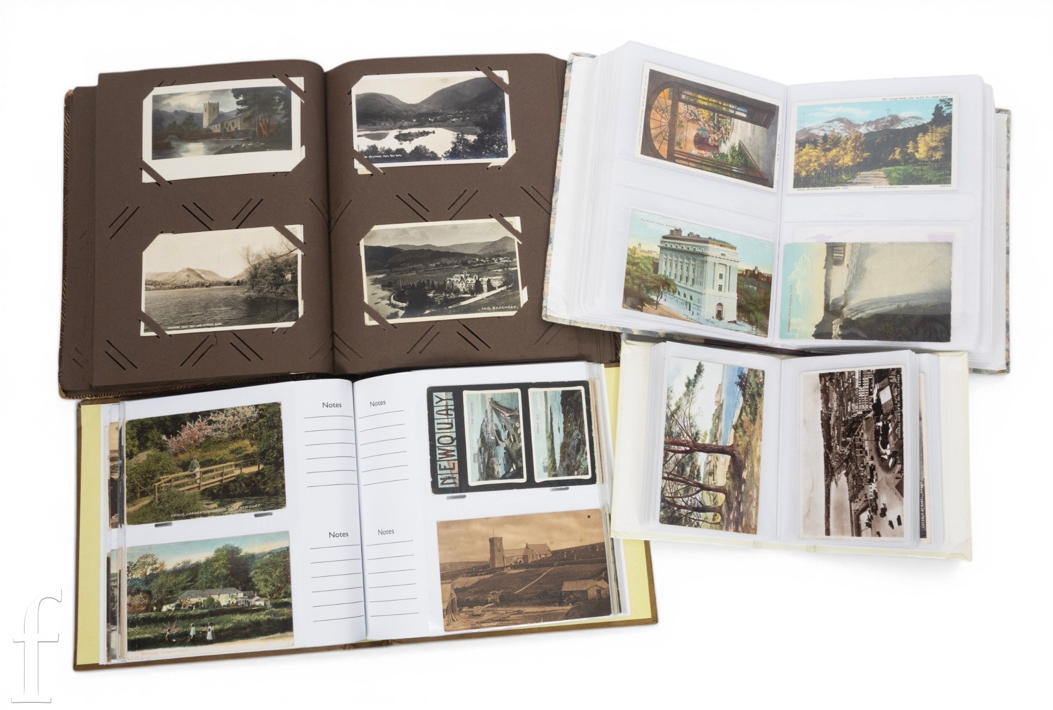 A large collection of postcards contained in four albums, some North ...