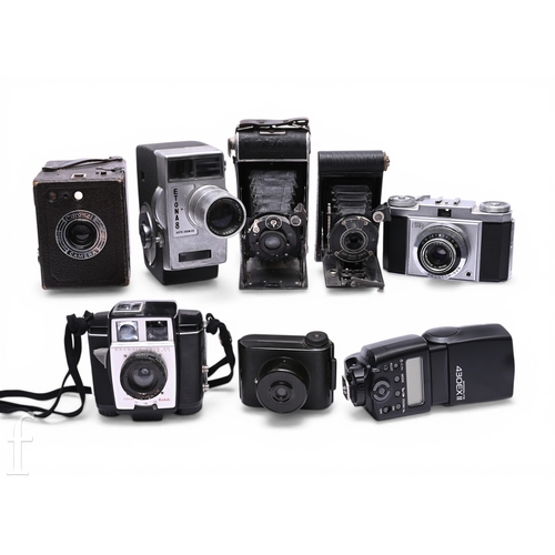 148 - A collection of assorted cameras to include an Eaton 8 Auto Zoom 8mm film camera, Brownie Twin 20, C... 