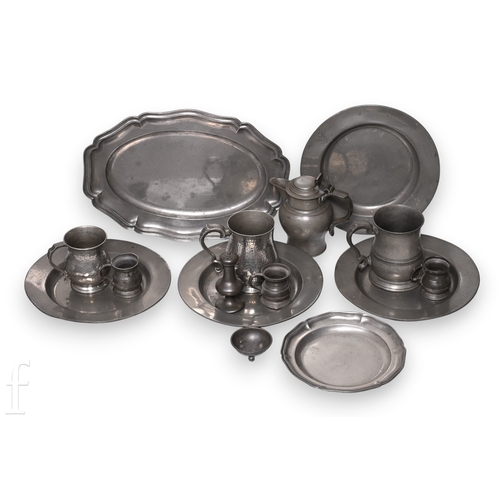 329 - A collection of early 19th Century and later pewter tankards, tavern plates, dishes, gill measures e... 