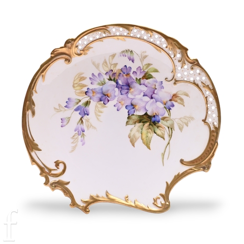 851 - A Royal Worcester Empress plate, reticulated scroll border, painted with wisteria racemes over ivory... 