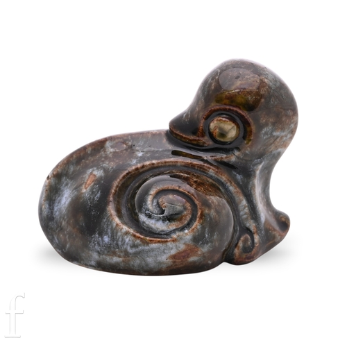 838 - A Doulton Lambeth stoneware figure of a grotesque 'Duck' modelled by Mark V Marshall, picked out in ... 