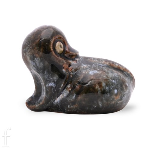 838 - A Doulton Lambeth stoneware figure of a grotesque 'Duck' modelled by Mark V Marshall, picked out in ... 