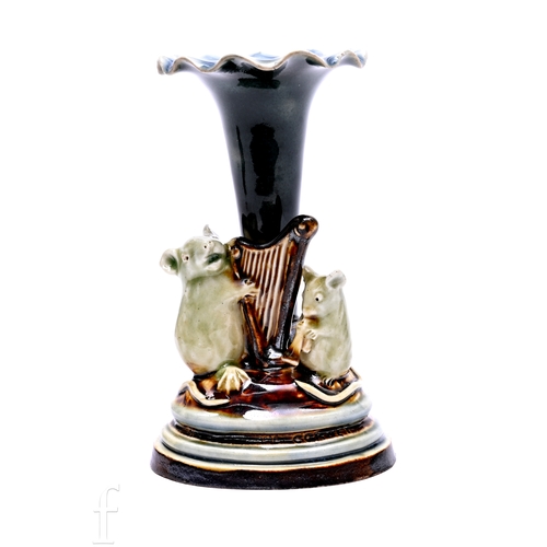 841 - A Doulton stoneware 'Mouse Musicians' spill vase by George Tinworth, modelled as a larger mouse play... 