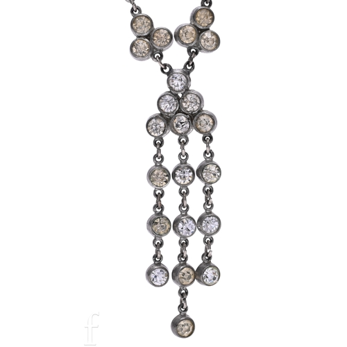 118 - A paste necklace, circa 1920-30, the necklace composed of trefoils of white paste collets suspending... 