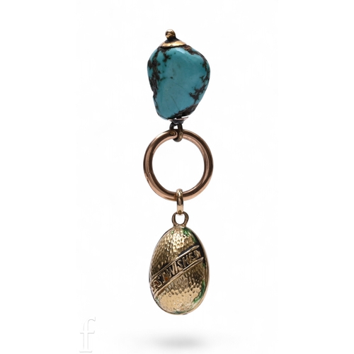 114 - A gold egg charm, the textured mount with 'BEST WISHES' to one side, and a space for a gemstone high... 