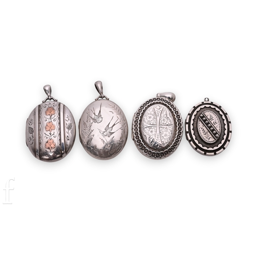 61 - A late Victorian locket, the oval locket with engraved scroll detail and three applied gold leaves t... 