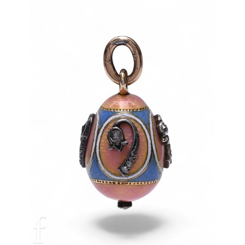 116 - Faberge; An enamel and diamond egg pendant, decorated with white, blue and pink guilloche enamel wit... 