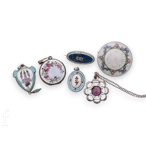 65 - An enamel on sterling silver pendant, of oval form, rose bud decorated to opal ground within turquoi... 