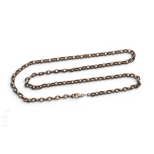 76 - A yellow metal curb link chain with lobster claw clasp, indistinct impressed marks to end link, leng... 