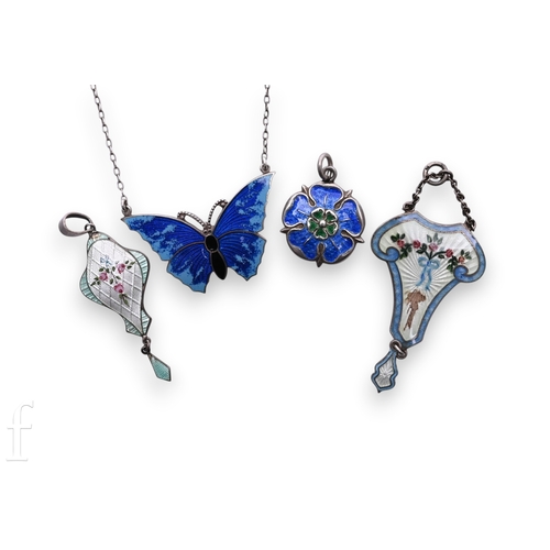 90 - A two tone blue enamelled butterfly pendant, hallmarked for silver, total weight 8.4g, and three fur... 