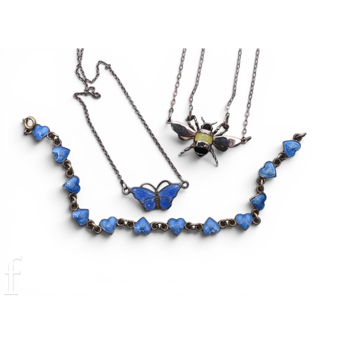 94 - A Guilloche enamelled bracelet of pale blue enamel, with textured connecting links, marked '925 S', ... 