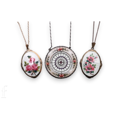 95 - An enamelled pendant, the circular pendant with guilloche enamelled rose buds with foliage against a... 