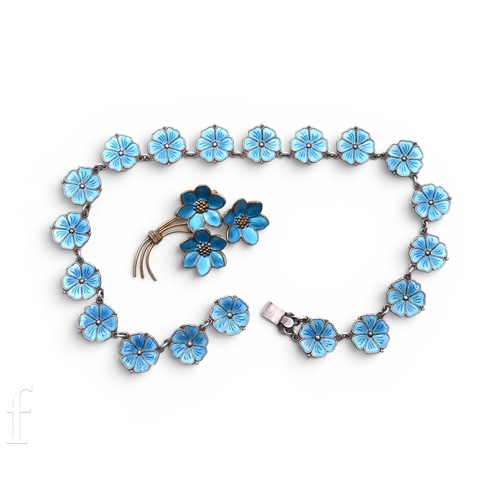 97 - A Danish silver necklace, composed of nineteen turquoise blue guilloche enamel flower heads, with si... 