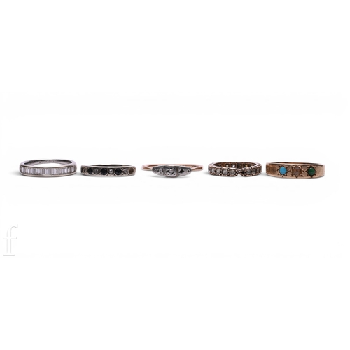 111 - A half hoop diamond eternity ring, set with baguette cut diamonds, hallmarked for 18ct gold, total w... 