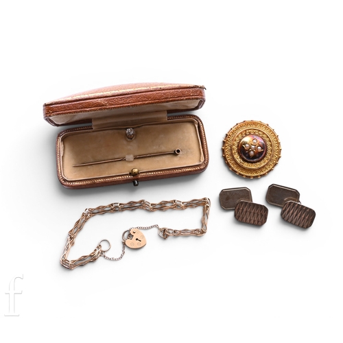 112 - A mid Victorian roundel brooch, circa 1870, set to the front with half pearls, locket backed to the ... 
