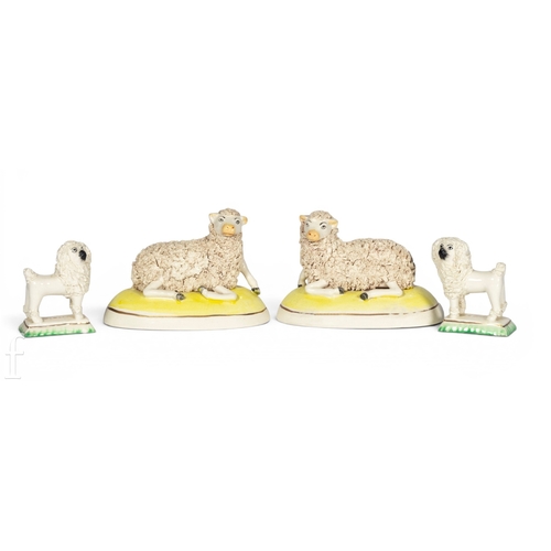 804 - A pair or mid 19th Century Staffordshire poodles, modelled standing on rectangular plinth base, heig... 