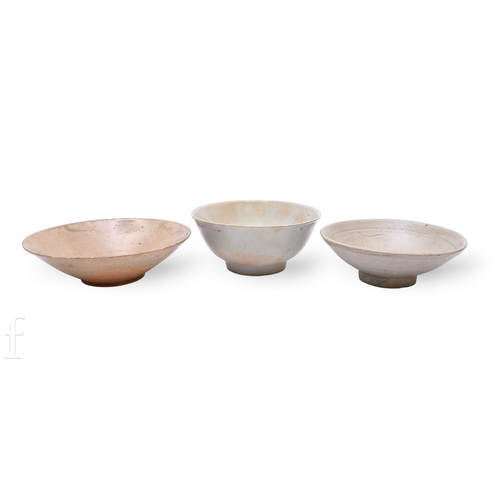 1247 - A collection of Chinese Song/Yuan Dynasty Chinese Qingbai ware bowls, each of similar form, with var... 