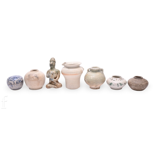 1250 - A collection of Asian porcelain items, to include a Thai mother and child Tukatha figure, a Korean p... 
