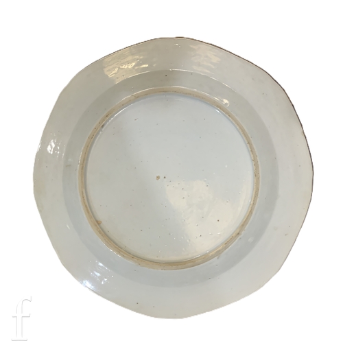 1251 - A collection of four Chinese 18th Century export porcelain plates, all of circular form, with blue a... 