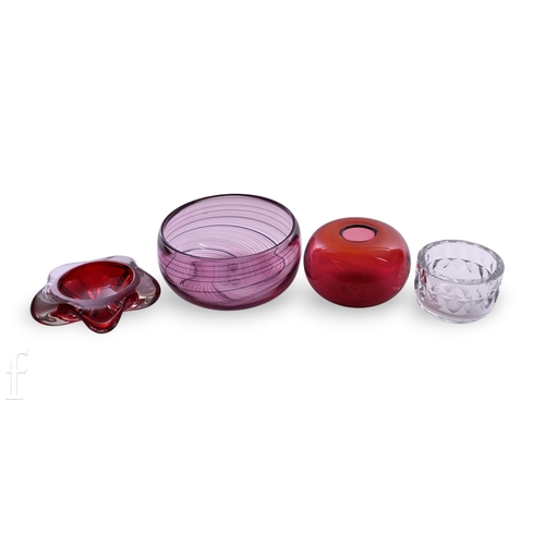 1142 - A Martin Andrews ruby glass vase of compressed spherical form, signed, height 9cm, diameter 13cm, a ... 