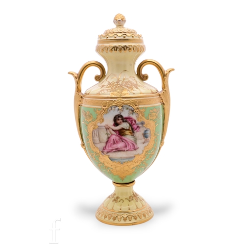 An early 20th Century Coalport pedestal vase, of ovoid form with circular foot, applied scroll handles and waisted collar, the body decorated with a classical maiden in shaped raised paste gilded cartouche over apple green ground, printed marks to base and shape no.V3557, height 26cm.