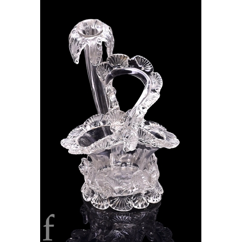55 - John Walsh Walsh - A late 19th Century clear glass basket with pincered glass bands, twisted pincere... 