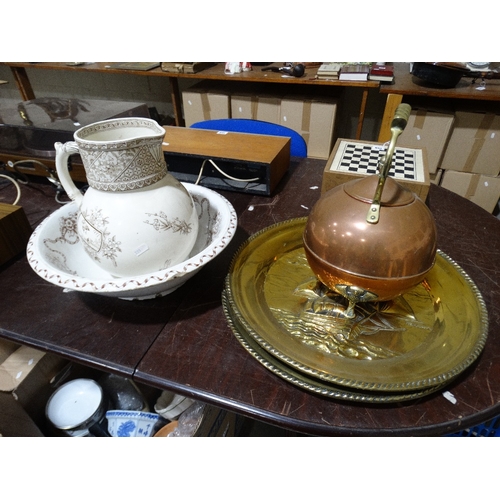 160 - A Vintage Copper Kettle, Together With Two Brass Chargers & A Pottery Wash Jug & Basin