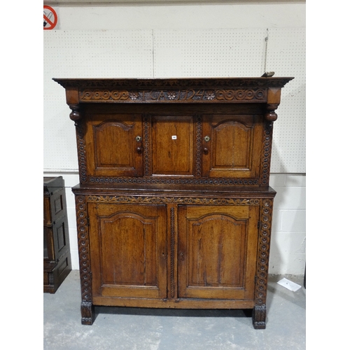 242 - An 18th Century Welsh Oak Deuddarn, The Upper Section Having Two Side Panelled Doors With A Fixed Ce... 