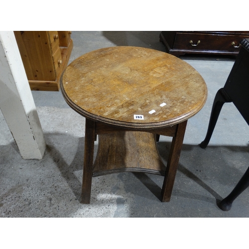 263 - An Early 20th Century Circular Topped Oak Two Tier Table